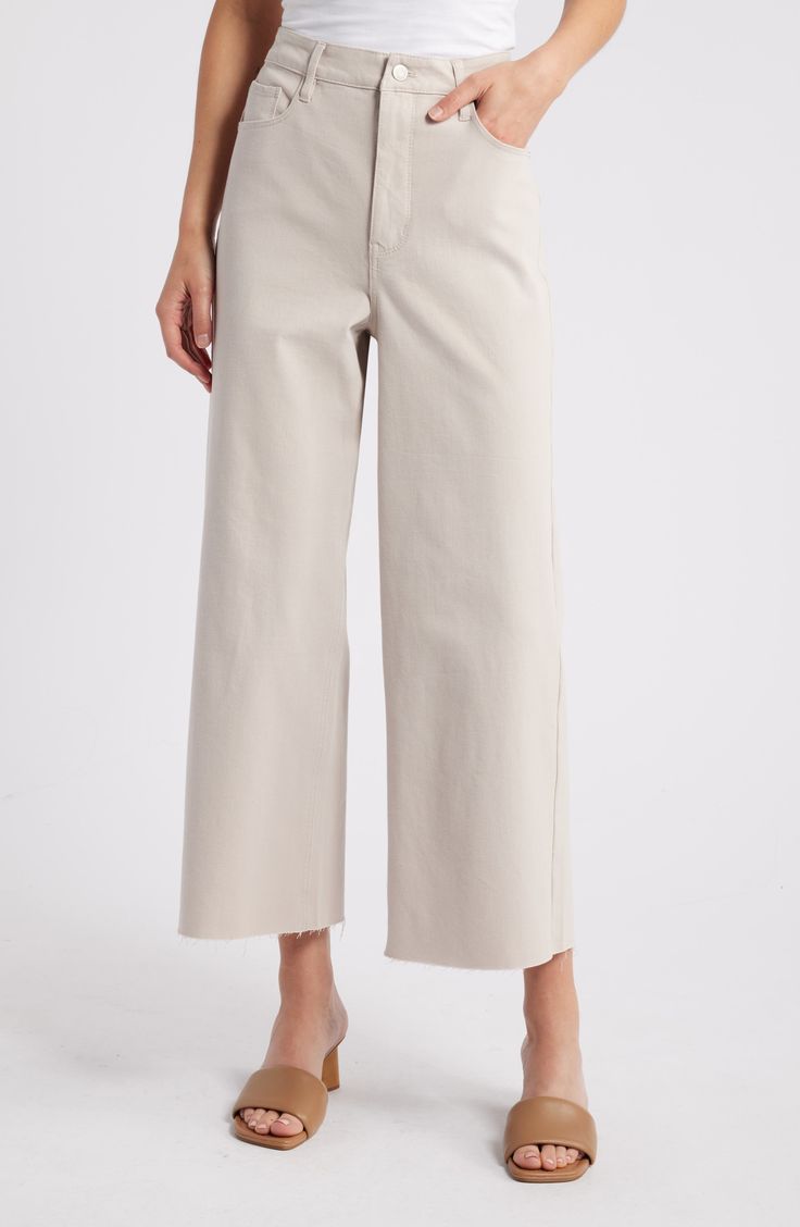 A kicky cropped length and frayed hems add style points to these stretch-kissed jeans you'll wear on repeat. 25" inseam; 20" leg opening; 11" front rise; 15" back rise (size Medium) Zip fly with button closure Five-pocket style 58% cotton, 25% polyester, 13% viscose, 4% elastane or 54% cotton, 27% polyester, 14% viscose, 5% elastane Machine wash, tumble dry Imported Spring Cotton Cropped Hem Bottoms, Spring Cropped Hem Cotton Bottoms, Spring Cotton Bottoms With Cropped Hem, Spring Denim Bottoms With Cropped Hem, Spring Cropped Hem Denim Bottoms, Wide Leg Cropped Jeans With Frayed Hem, Wide Leg Cropped Jeans With Frayed Hem For Fall, Spring Cropped Jeans With Frayed Hem, Wide Leg Pants With Frayed Hem For Work