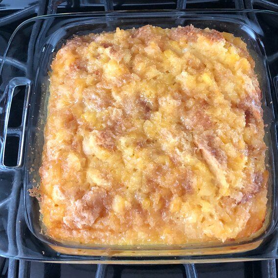 a casserole dish sitting on top of an oven