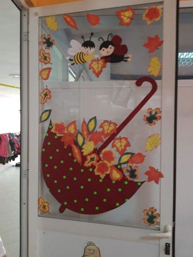 a display case with an umbrella and flowers on it