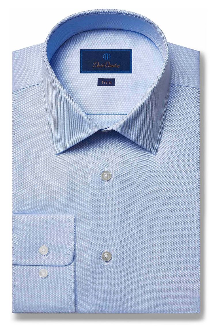 A smart spread-collar shirt is cut from finely textured yet substantial oxford cloth and tailored with pleats, a French placket and rounded, adjustable cuffs. Removable collar stays Adjustable button cuffs Back pleats Shirttail hem 100% cotton Machine wash, line dry Imported Elegant Fitted Oxford For Business Casual, Elegant Fitted Oxford For Semi-formal Occasions, Elegant Fitted Oxfords For Work, Timeless Fitted Oxford For Workwear, Timeless Fitted Oxford Shoes For Work, Elegant Fitted Oxford Shoes For Semi-formal Occasions, Elegant Wrinkle-resistant Dress Shirt For Spring, Elegant Spring Shirt, Wrinkle-resistant, Classic Fitted Oxford For Workwear