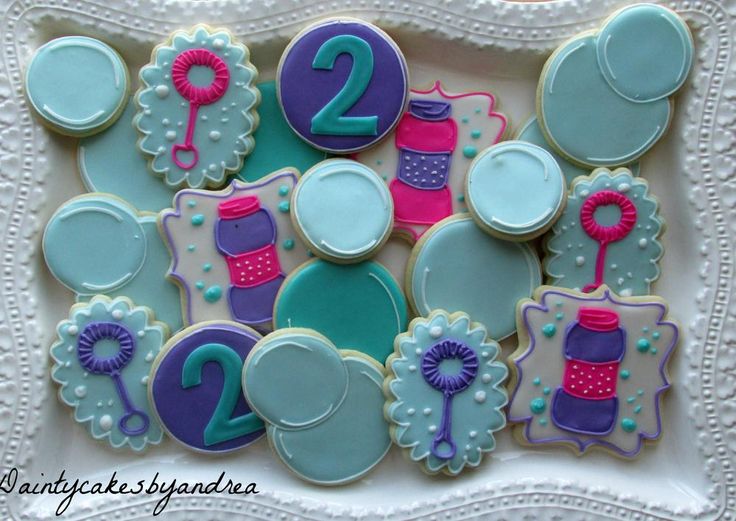 decorated cookies are arranged in the shape of numbers