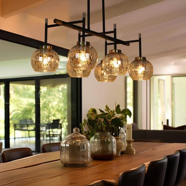 a wooden table topped with lots of lights