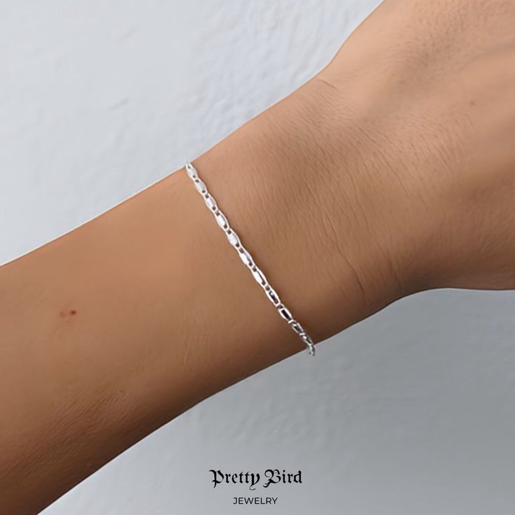 Product Details + Care - 14k White Gold Plated - 1 Bracelet - Wipe Clean 6.9” Length Made In Italy Photos Pretty Bird Usa Llc 2023 Ig @Prettybird_usa Www.Prettybirdjewelry.Com Gift White Chain Bracelet With Solid Link Construction, White Chain Bracelet With Solid Links As Gift, Formal Silver Paperclip Bracelet, Tarnish Resistant, Silver Tarnish Resistant Paperclip Bracelet For Formal Occasions, Formal Silver Paperclip Bracelet Tarnish Resistant, Classic White Chain Bracelet For Everyday, Minimalist White Figaro Chain Jewelry, Classic White Chain Bracelet With Solid Links, Classic White Link Bracelets