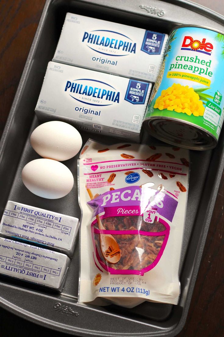 an open baking tray containing eggs, milk, and other ingredients