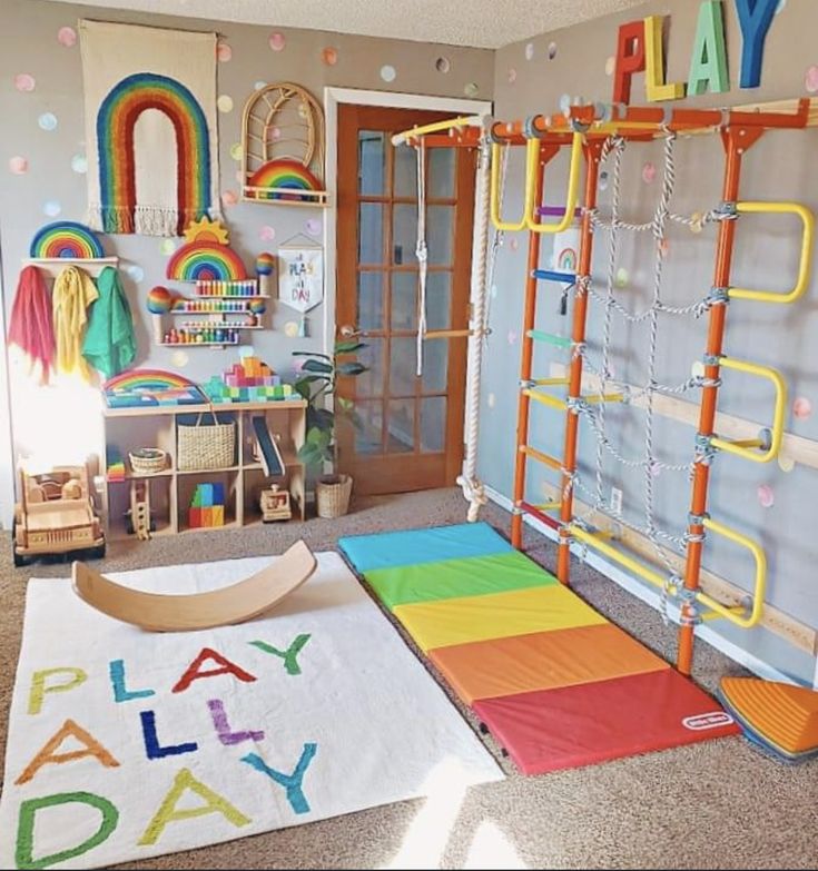 a child's play room with toys and rainbow rugs on the floor in front of it