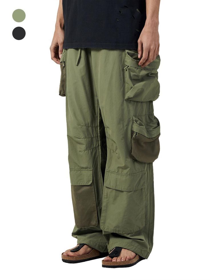 It is a casual modified cargo pant with mesh fabric point. The pant is made of cotton and nylon blend fabric, which make silky touch and lightweight and comfy fit.- Elastic band on the back waist- Side pockets- Back pockets- Mesh pockets- Bar tacks on pockets Combat Cargo Pants With Pockets, Khaki Full-length Utility Parachute Pants, Khaki Combat Bottoms With Multiple Pockets, Techwear Trousers With Patch Pockets, Khaki Techwear Bottoms With Cargo Style, Combat Cargo Pants With Side Pockets, Military Style Full-length Parachute Pants With Pockets, Military Style Full-length Parachute Pants With Multiple Pockets, Military Full-length Parachute Pants With Pockets