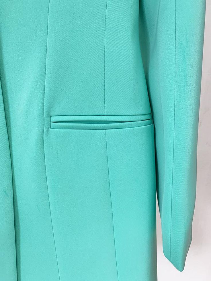 Imelda Green Oversized Blazer for Women - Slim Fit The women's oversized blazer that can be worn as a dress is available in black and Teal green, featuring a peak collar and single-button design for a professional and stylish look. It includes two faux pockets and big shoulder pads, adding sophistication to the garment. This versatile dress can be worn to both the office and special events. The high-quality lining ensures comfort throughout the day. With its knee-length cut, it adds a modern and Spring Structured Blazer Dress With Hidden Button Closure, Structured Blazer Dress With Hidden Button For Spring, Semi-formal Green Blazer With Double Button Closure, Spring Single-breasted Notched Blazer Dress, Spring Notched Single-breasted Blazer Dress, Spring Single Breasted Notched Blazer Dress, Green Semi-formal Blazer For Fall, Green Fall Blazer For Semi-formal Occasions, Spring Notch Lapel Blazer Dress For Career