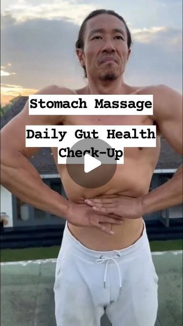 a man standing in front of a house with his hands on his hips and the words stomach massage daily gutt health check - up