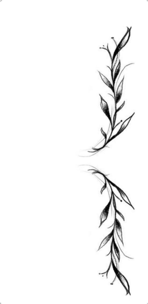 a black and white drawing of two leaves on a branch in the shape of a letter t