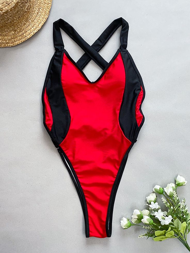 Indulge in the epitome of beachside sophistication with our Splice One-Piece Bikini Swimsuit designed exclusively for women. Crafted with precision, this swimsuit merges style with comfort seamlessly. The strategic splice design accentuates your curves while providing ample support, ensuring you feel confident and poised whether lounging by the pool or diving into the waves. Embrace versatility with this timeless piece that effortlessly transitions from sun-soaked days to twilight beach strolls. Red One-piece Nylon Swimwear, Red Nylon One-piece Swimwear, Red Stretch One-piece Swimsuit, Red Stretch Tankini For Pool, Red Stretch Tankini For Beachwear, Red Summer Swimwear For Poolside, Red Sleeveless Swimwear For Beach Party, Red Nylon Swimwear For Sunbathing, One-piece Color Block Swimwear For Beach