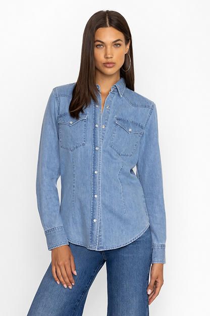 The classic western shirt makes a return, refined to perfection. The Provence Denim Shirt in Light Antique Wash brings style and polish to your wardrobe with its mix of fine tailoring and on-trend details. The light antique wash adds a vintage touch that allows it to go from casual to dressy with ease, adding a touch of boho sophistication to any look. Johnny Was Women's Provence Denim Shirt in Light Antique Wash Blue, Size Large Classic Shirt With Spread Collar In Medium Wash, Classic Medium Wash Shirt With Spread Collar, Classic Fitted Denim Top With Pockets, Classic Fitted Denim Top, Classic Fitted Denim Top For Work, Fitted Classic Denim Top For Work, Fitted Long Sleeve Denim Top For Work, Classic Medium Wash Shirt For Work, Classic Medium Wash Denim Top With Snap Buttons