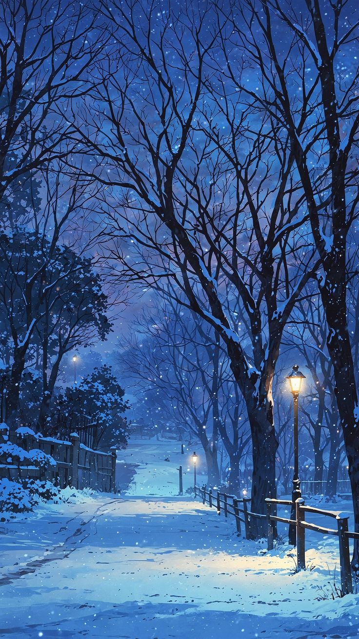 a snowy night with street lights and trees