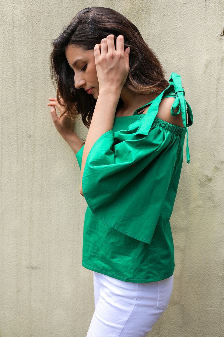 Brand Name:SIMPLEEMaterial:CottonClothing Length:RegularStyle:FashionFabric Type:TwillSleeve Length(cm):Three QuarterDecoration:NonePattern Type:SolidCollar:Slash neckSleeve Style:Flare SleeveModel Number:BL260Gender:Women Chic Green Off-shoulder Top, Green Blouse For Spring Day Out, Spring Fitted Tops With Tie Sleeves, Chic Green Off-shoulder Blouse, Fitted Casual Tops With Tie Sleeves, Casual Fitted Top With Tie Sleeves, Green Off-shoulder Blouse, Stretch Cotton Off-shoulder Blouse, Summer Blouse With Tie Sleeves And Short Sleeve