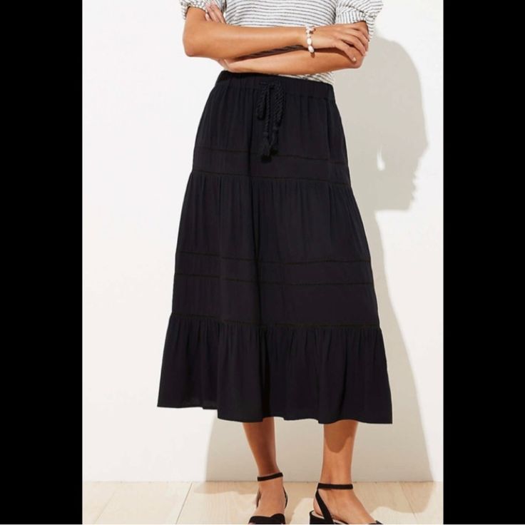 Delicate Lace Trim And A Tasseled Drawstring Waist Highlights The Bohemian-Chic Appeal Of This Flowy Midi Skirt. Elasticized Drawstring Waist. Partially Lined. Shell: 100% Viscose. Lining: 100% Polyester. Imported. Black Tasseled Skirt For Spring, Casual Black Bottoms With Tassels, Black Casual Bottoms With Tassels, Black Tassel Skirt, Flowy Midi Skirt, Bohemian Chic, Women Skirts Midi, Outfit Idea, Drawstring Waist