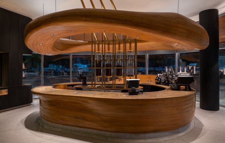 a large wooden sculpture in the middle of a room