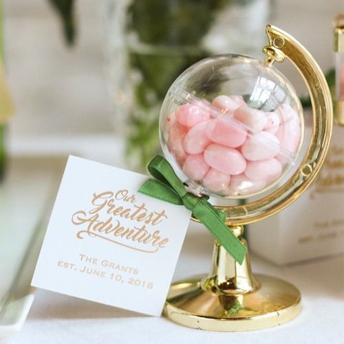 the mini globe party favors are displayed on an instagramture for people to use