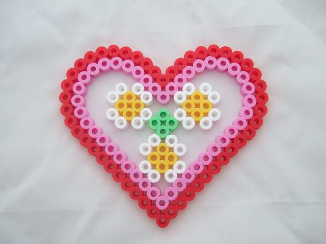 a heart shaped object made out of legos