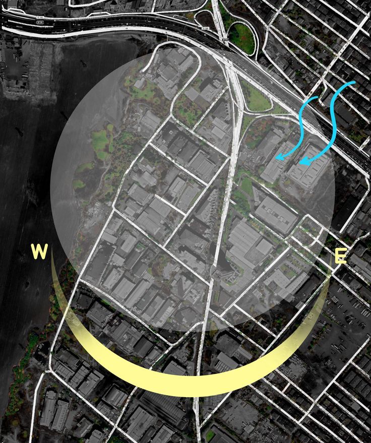 an aerial view of a city with roads and streets in the center, surrounded by yellow lines