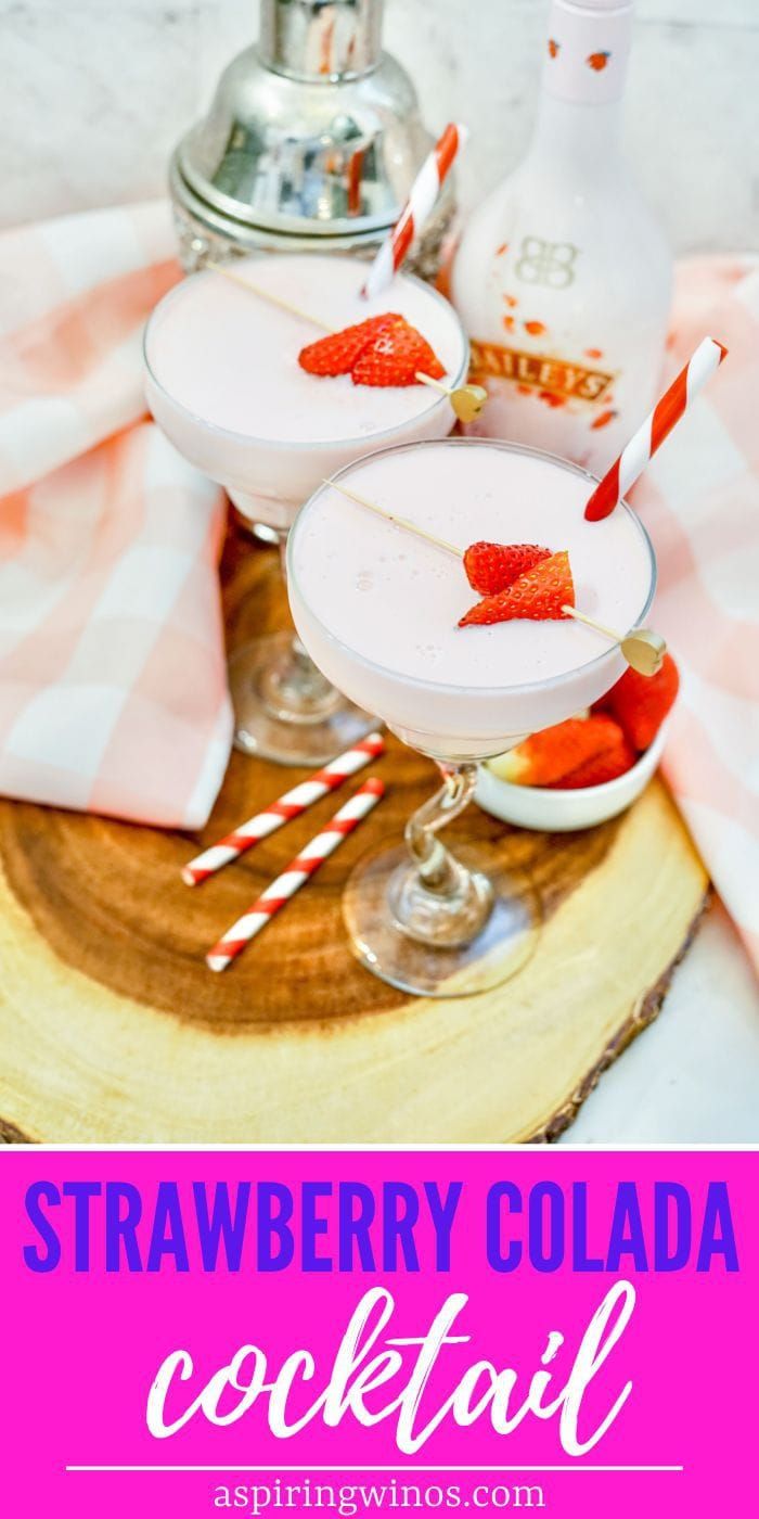 strawberry cola cocktail in glasses with strawberries on the rim and pink striped napkins