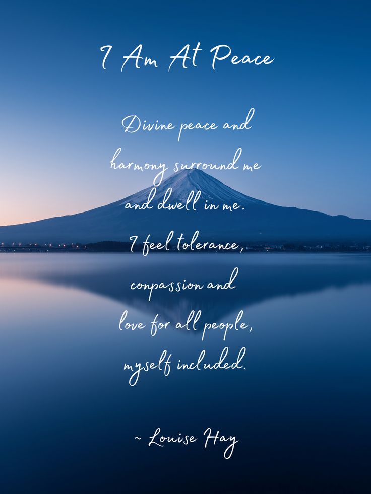 a poem written on the water with a mountain in the background