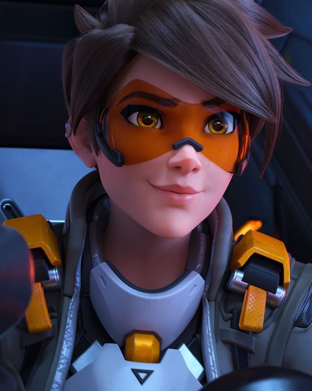 an overwatching female character with yellow eyes and orange nose makeup looks at the camera