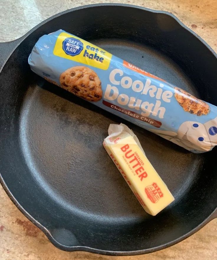 a cookie dough and butter on a frying pan