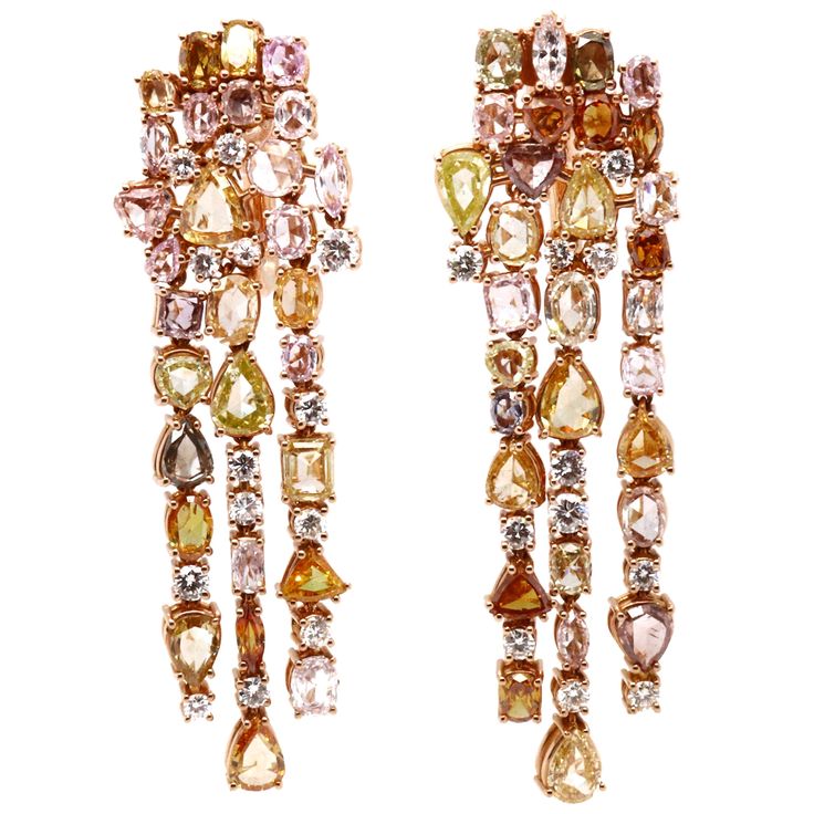 This 18K rose gold exclusive chandelier earrings are from our Divine collection. These chandelier earrings are a perfect combination of natural white diamonds in total of 1.22 Carat and fancy yellow diamonds in total of 7.51 Carat. The total metal weight is 21.04 Carat.They are 5.5 cm long. The piece of jewellery is a perfect addition to any special occasions. The Divine Collection has a unique blend of history, tradition and modern refinement inspired by the baroque period and its sophisticated style, providing extreme magnificence and prestige in all its pieces. As in the Baroque art, the jewellery is an elaborate and highly detailed work of art representing the company’s heritage and celebrating the history of the country where it all started, Italy. The Divine collection by VITALE 1913 Rose Gold Jewelry Outfit, Contemporary Jewelry Earrings, Gold Statement Jewelry, Art Deco Drop Earrings, Pink Gold Jewelry, Baroque Period, Gold Diamond Drop Earrings, Art Baroque, Yellow Diamond Earring