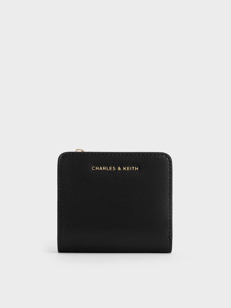 This product is made with at least 20% sustainable materials by weight. CHARLES & KEITH uses recycled, degradable, organic, and water-based materials in our eco-conscious collection.This top zip wallet in black is the perfect addition to any small accessory collection. With a compact and classic silhouette, it is lightweight and functional. It opens up to a compartmentalised interior that features a note bill section, multiple card slots, as well as a zipped compartment for your coins. The snap- Belt Ring, Charles Keith, Zip Wallet, Small Wallet, Printables Kids, Small Accessories, Kids Gifts, Belt Size, Jewelry Trends