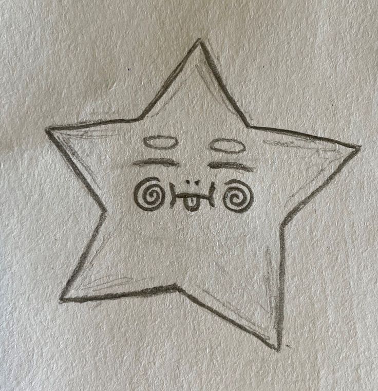 a drawing of a star with eyes drawn on it