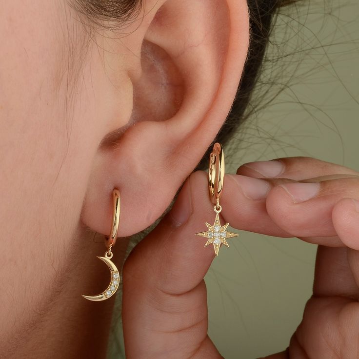 These earrings are made with Moon And Star Pave Huggie Earrings, 14K Solid Gold Hoops, and Diamond Star Hoop. Dainty Earrings, Celestial Jewelry, Perfect Gift for Her. * SKU: SGE01419 * Made to Order * Gold Purity: 14K Solid Yellow Gold (stamped) * Custom Gold Color: Rose Gold, Yellow Gold, White Gold * Custom Gold Purity: 9K/14K/18K (Charges Apply) * Diamond 100% Genuine Diamond * Diamond Weight: 0.10 ct. * Diamond Color: G-H * Diamond Clarity: SI * Diamond Cut: Brilliant Cut (Excellent) Produc Celestial Style Yellow Gold Round Hoop Earrings, Celestial Hoop Earrings Tarnish Resistant, Celestial Style Yellow Gold Huggie Jewelry, Celestial Tarnish Resistant Hoop Earrings, Celestial Pierced Huggie Jewelry, Celestial Style 14k Yellow Gold Hoop Earrings, Celestial Yellow Gold Round Hoop Earrings, Celestial Style Yellow Gold Hoop Earrings, Celestial Huggie Pierced Jewelry