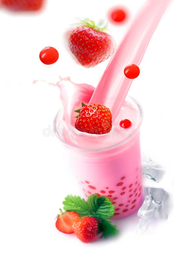 strawberry milkshake with strawberries on white background royalty free stock photos - image