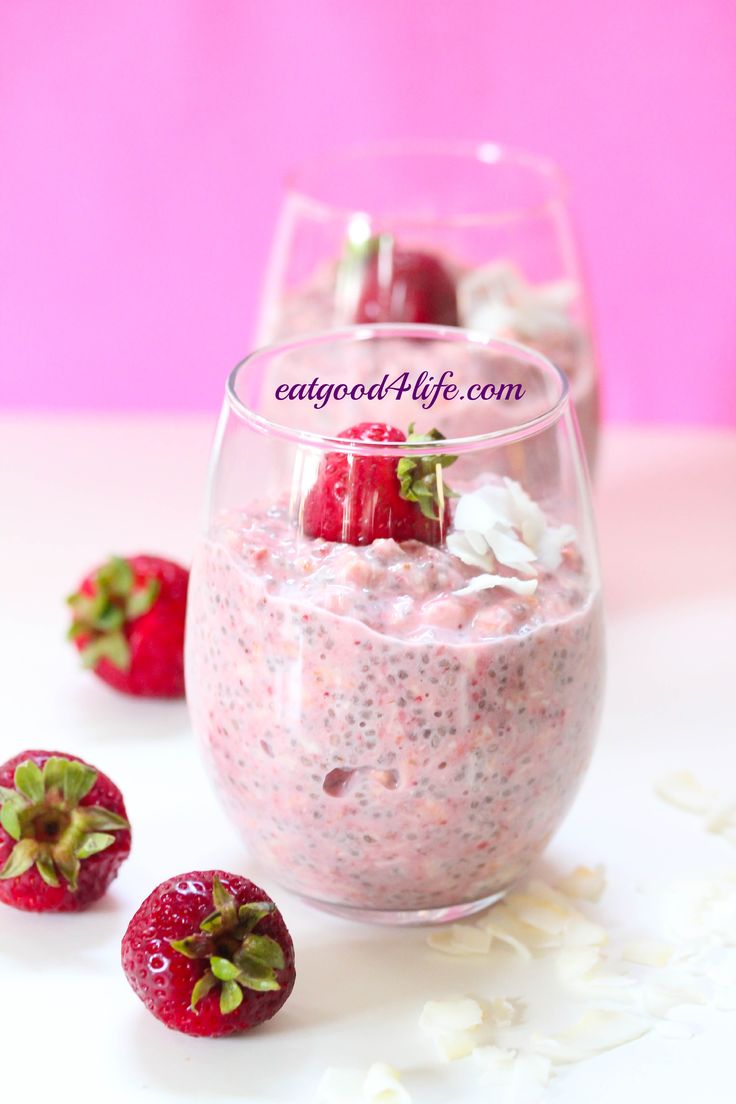 strawberry chia pudding in a glass with strawberries on the side