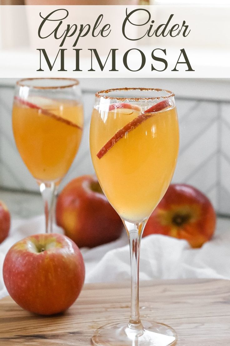 two glasses filled with apple cider mimosa