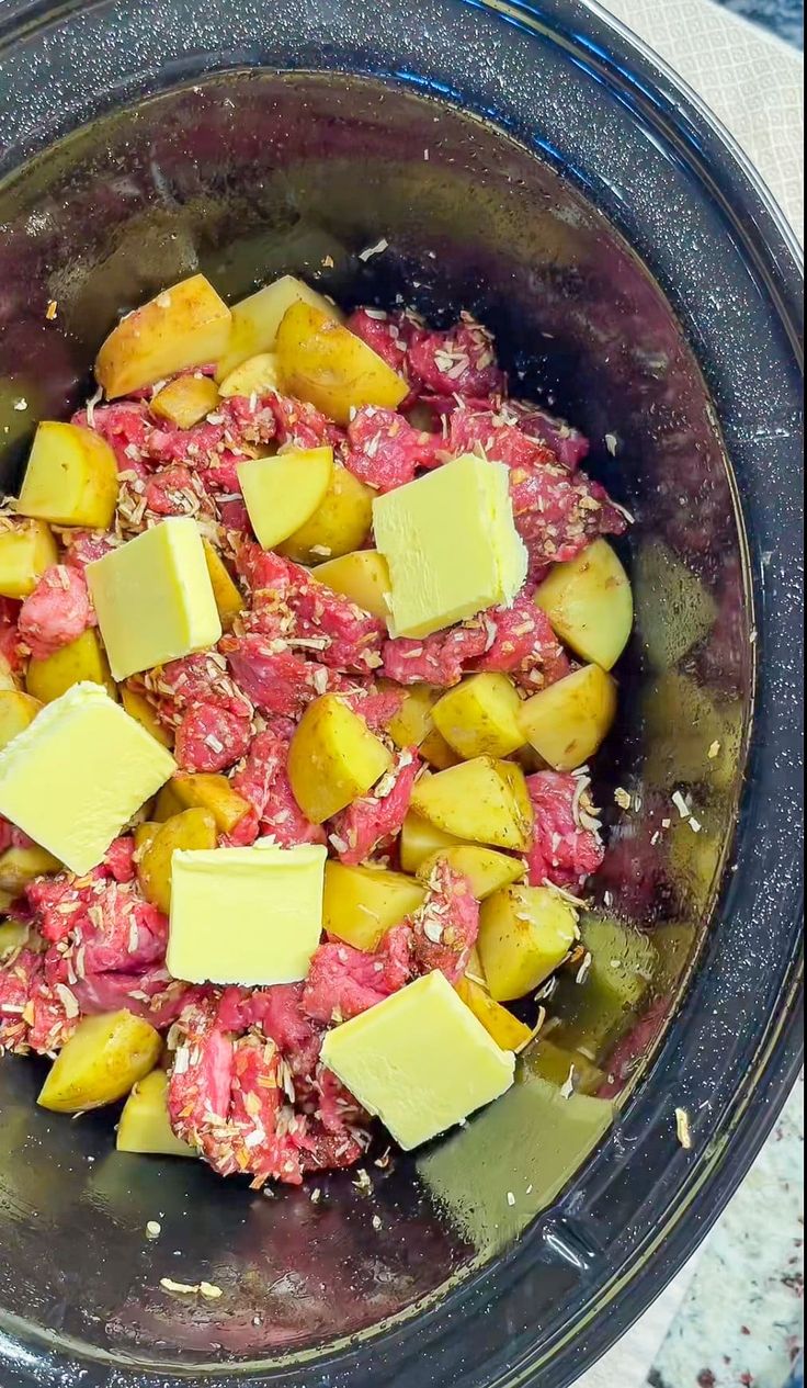 the food is prepared and ready to be cooked in the slow cooker for consumption