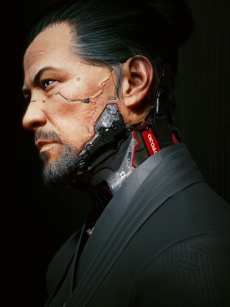 a man with black hair and piercings on his face is wearing a futuristic suit