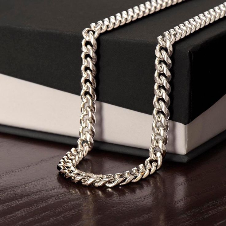 Stainless Steel Chain Cuban Link Necklace! 5mm Chain available Polished Stainless Steel or 14k Gold. 3-5 day Free Delivery! Special Limited Time Offer. Give your special someone a classic necklace that shows off their strength and style! Our Cuban Link Chain is the perfect gift for any occasion, including birthdays and holidays. Available in polished stainless steel or 14K yellow gold, you can be sure this wonderfully weighted necklace will be a staple piece in their wardrobe. And since the chain is adjustable, this necklace will look spectacular on everyone who wears it. Romantic Gifts For Boyfriend, Boyfriend Necklace, Promise Necklace, Cuban Link Necklace, Bracelet Viking, Unique Anniversary Gifts, Cuban Link Chain Necklaces, Classic Necklace, Mors Dag