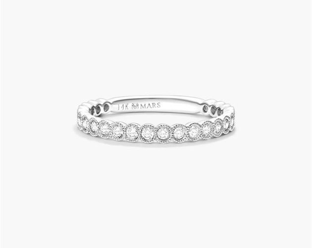 14K White Gold Milgrain Bezel Diamond Ring. Crafted in 14K white gold, this contemporary band featuring bezel set round-cut diamonds with delicate milgrain detail is chic and timeless. Wear this simply beautiful band on its own or mix and match with other stackables for a fashion forward look. Elegant Formal Stackable Rings With Smooth Bezel, Timeless White Gold Stackable Rings With Bezel Setting, Elegant Stackable Rings With Smooth Bezel For Anniversary, Elegant Stackable Rings With Bezel Setting, Elegant Milgrain Round Cut Rings, Elegant White Gold Jewelry With Milgrain Detailing, Elegant White Gold Milgrain Jewelry, Elegant Round Band Jewelry With Milgrain, Elegant Milgrain Rings For Anniversary