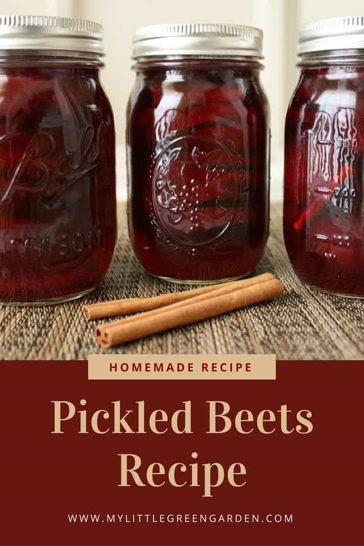 three jars filled with pickled beets and cinnamon sticks on top of a table