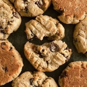 chocolate chip cookies are arranged on a baking sheet