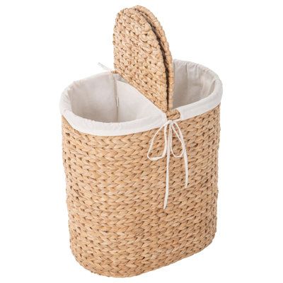 an empty basket with a handle on the side and a white lining around the bottom