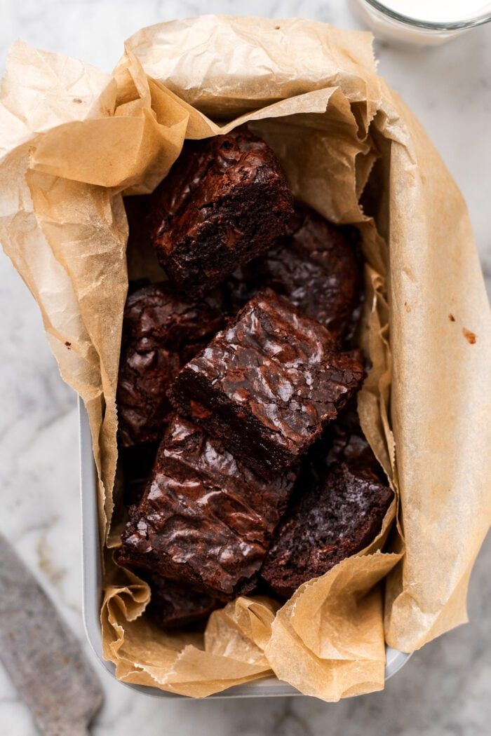 some brownies are in a tin on a table