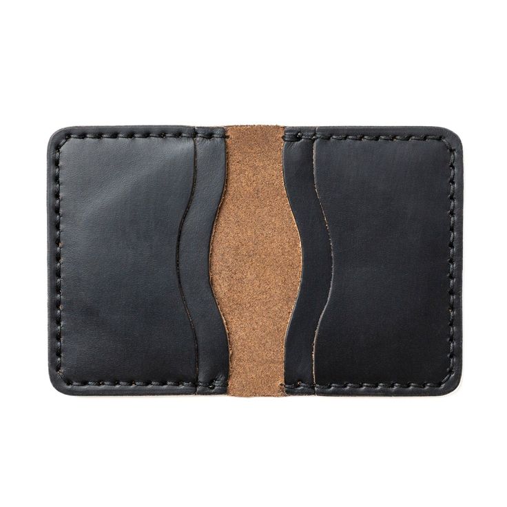 A Leather Wallet that goes Above and Beyond Your Expectations.When you hold this wallet you will love the supple and comfortable feel. Unlike most department store wallets, our leather features premium leather, thick hand-stitching, and polished edges. Every inch of our craftsmanship has a high level of attention to detail. We build wallets to last a lifetime - and guarantee it.Our full-grain leather means your wallet will develop character and patina. We hand-sew this wallet with thick Tiger Th Leather Trifold Coin Purse With Rfid Blocking, Leather Trifold Wallet With Card Slots For Everyday, Classic Black Trifold Wallet For Everyday Carry, Classic Black Trifold Wallet For Daily Use, Classic Black Trifold Wallet For Everyday, Black Trifold Wallet With Coin Pocket For Daily Use, Black Bifold Wallet For Daily Use, Classic Black Wallets With Card Slots, Classic Black Wallet For Everyday Use