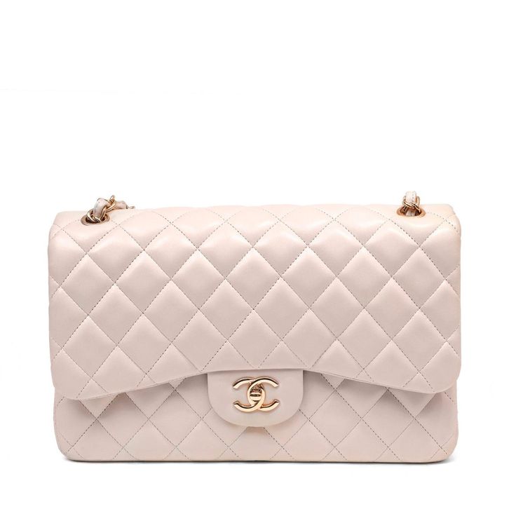 This Chanel Light Beige Lambskin Jumbo Classic Flap is in pristine condition. The highly sought-after Jumbo Classic is breathtaking in this feminine pairing of neutral light beige with rose gold hardware; rare and collectible. Quilted lambskin with rose gold tone interlocking CC twist lock on exterior flap. Press snap closure on interior flap with a leather lining. Elegant chain and leather entwined strap may be carried single or double. Dust bag included. Proudly offered from Only s for $9,500.00. Payment by bank wire only. Measurements: 12" x 7.5" x 4" drop: 13.5”/ 25” Please email for additional photos of this item PBF 12403 Bri Aesthetic, Chanel Bag Classic, Rose Gold Hardware, Trending Handbag, Vuitton Bag, Fendi Bags, Clothing Ideas, Classic Flap, Casual Backpack