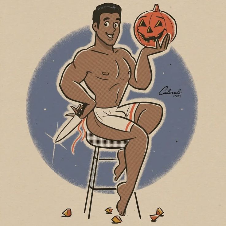 a man sitting on a stool holding up a jack - o'- lanterns pumpkin