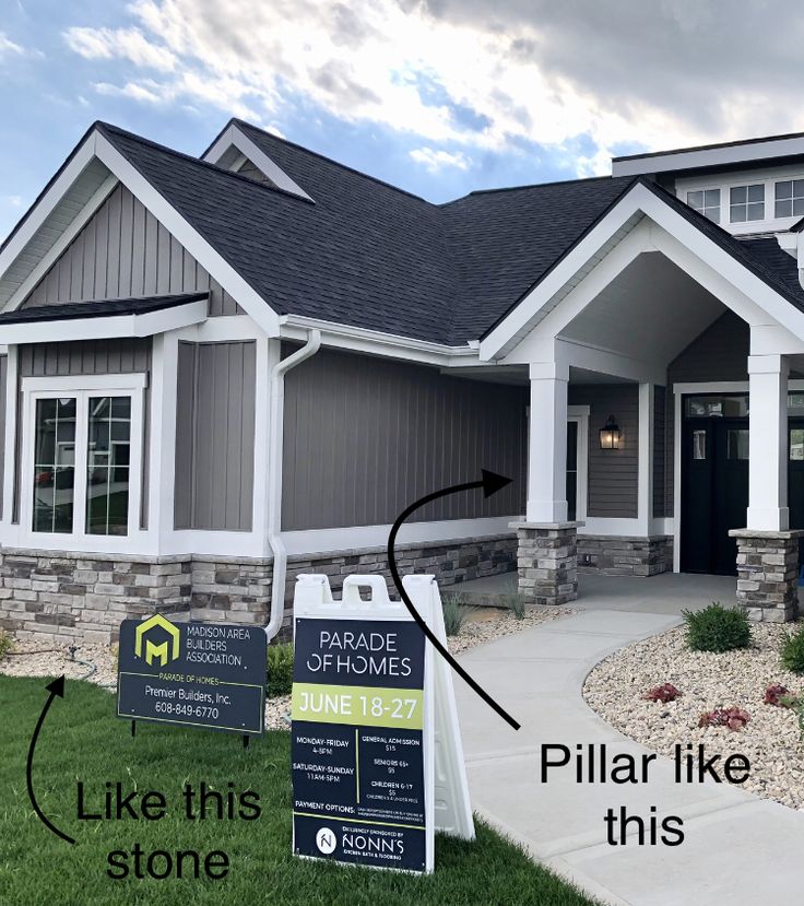 a house with a sign in front of it that says pillar like this