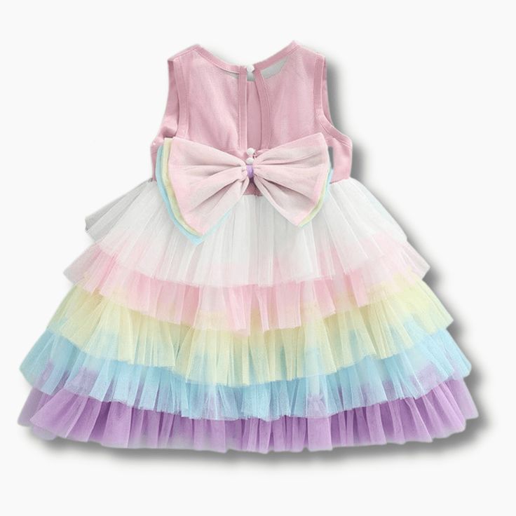 This charming, rainbow layered dress will make your little princess look just as glamorous as you! It features a multicolor, layered skirt, a tulle bodice and a bow at the back. Made for special occasions, this versatile dress can also be worn casually. Influencer @helena.modenezi Material: Cotton, polyester Tulle Bodice, Princess Look, Layered Dress, Layer Dress, Layered Skirt, Versatile Dresses, Little Princess, Influencer, Bodice