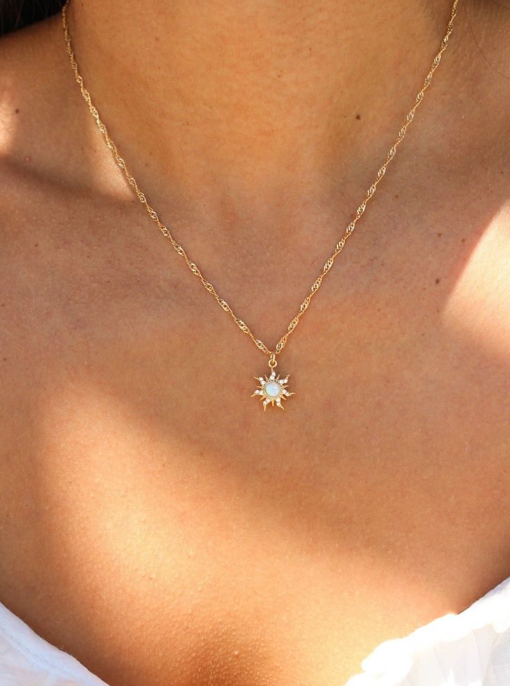 Embrace your inner princess with our Cassie Necklace. She features a gold filled chain, which makes it an elegant everyday necklace. Its dainty opal sun charm easily adds a pop of color to any outfit, ensuring you always stand out. This shiny piece is perfect for necklace layering or equally beautiful worn alone. Best of all, this necklace is tarnish free ! • Single Gold filled chain (of choice) with charm• Gold Filled• Bead Chain Length: 20"• Twist Chain Length: 16" + 1" extender (to make adjus Necklace Dainty Gold, Jewelry Gold Dainty, Casual Gold Jewelry, Single Charm Necklace, Small Dainty Jewelry, Simple Cute Jewelry, Dainty Necklaces Gold, Dainty Sun Necklace, Gold Jewelry Hoco