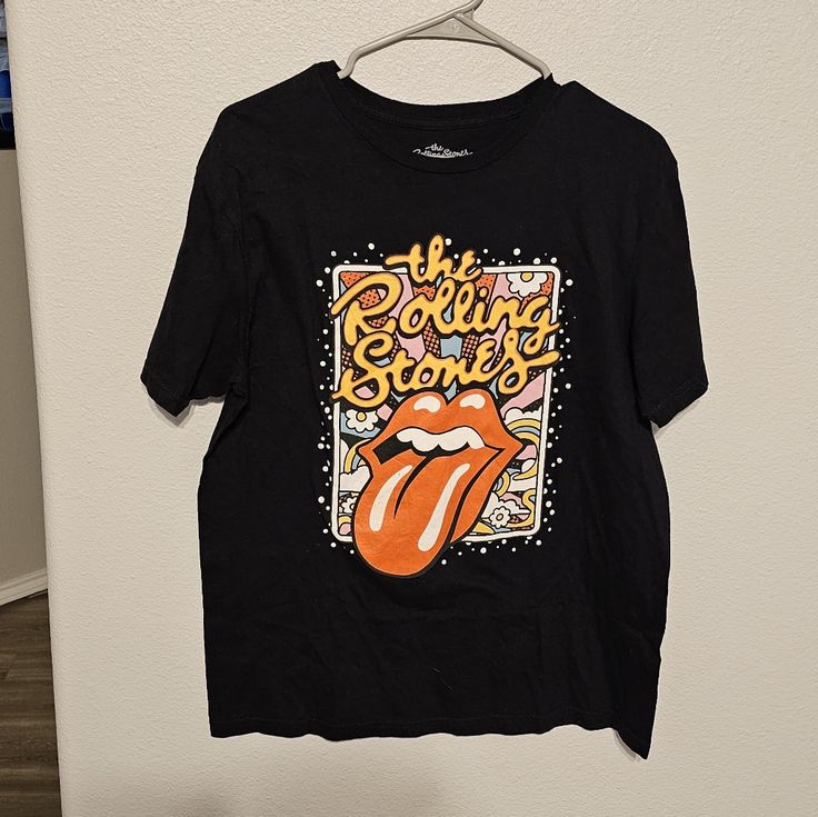 Size Medium The Rolling Stones Music Tee New Without Tags Great Condition Rock And Roll Retro Black Top For Concert, Black Music-themed Tops For Summer, Black Music-themed Top For Concert, Black Short Sleeve Music-themed Tops, Black Crew Neck Music-themed Top, Black Music-themed Graphic Top, Music-themed Black Crew Neck Top, Black Music-themed Graphic Tops, Black Music-themed Crew Neck Top