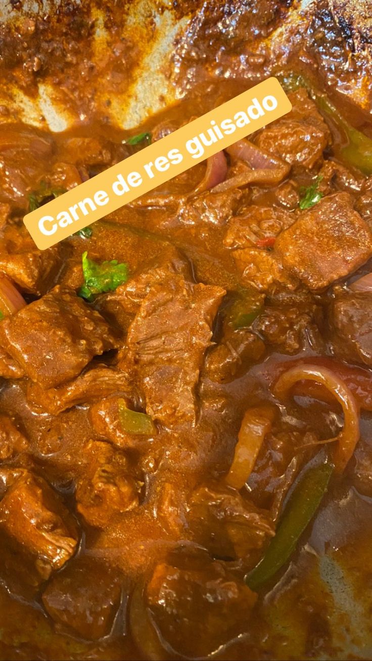 a close up of food in a pan with a sign that reads candeles gulshado