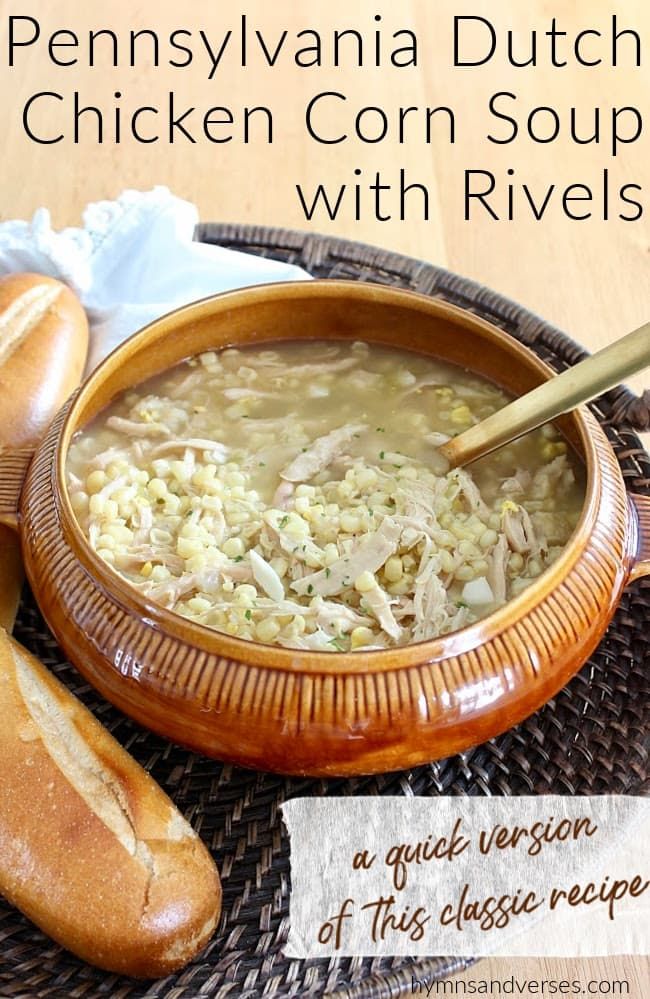 a bowl of chicken corn soup with bread on the side